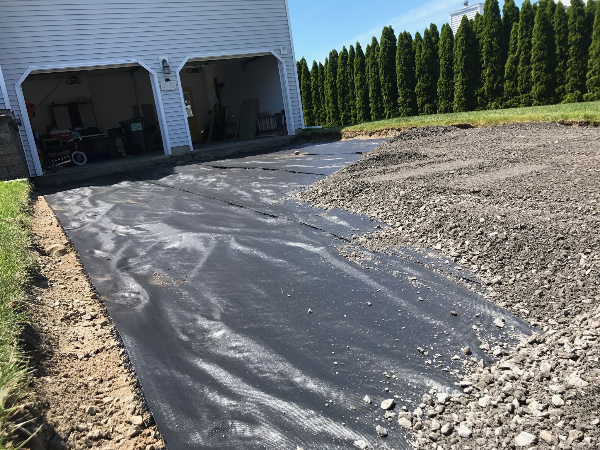 In-progress driveway resurfacing