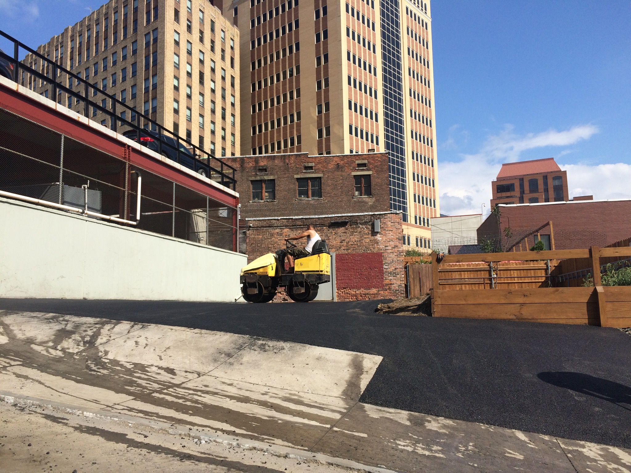 Small, freshly paved parking lot