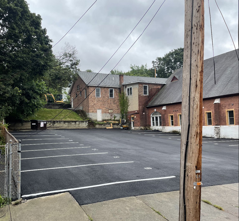 A newly paved and striped parking lot