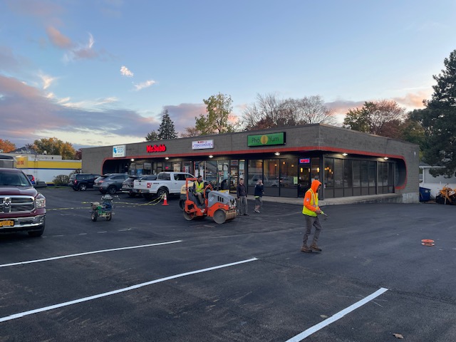 Newly paved parking lot in a strip mall