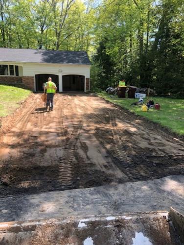 Digging out a residential driveway