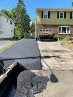 Residential driveway paving by Christopher's Paving - DURING